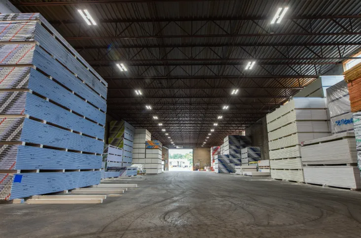 Stacks of products and boxes in warehouse